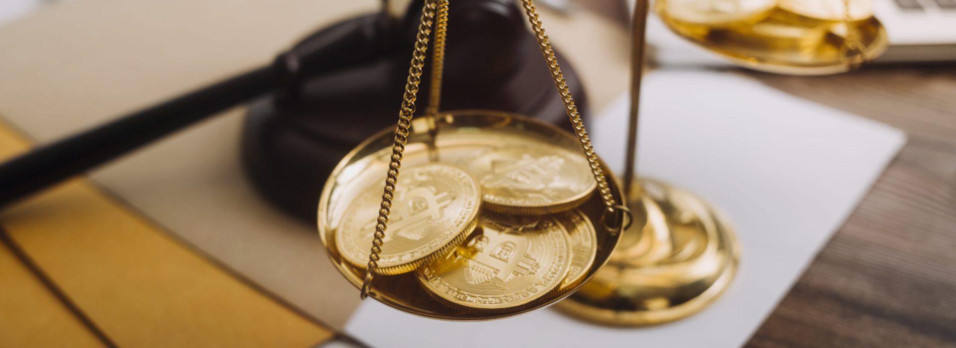 Business and lawyers discussing contract papers with brass scale on desk in office. Law, legal services, advice, justice and law concept picture with film grain effect